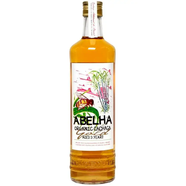 Bottle of Fazenda Vaccaro Abelha Organic Cachaça Gold Aged